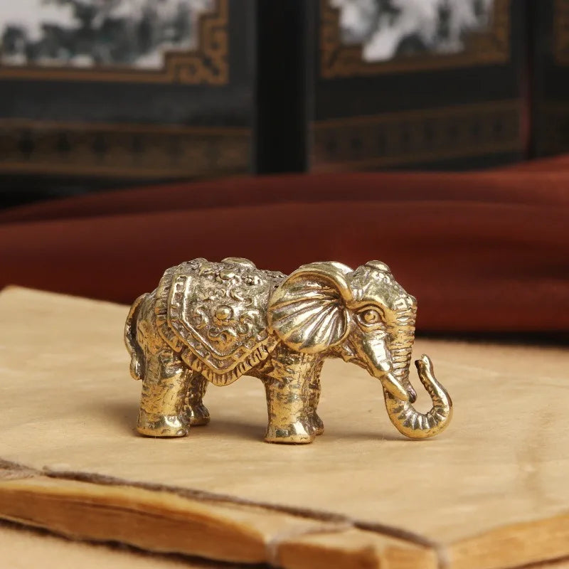 statuette éléphant bronze doré texture peau éléphant motifs floraux traditionnel asiatique décoration maison salon