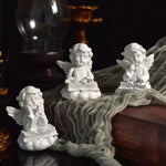 statuette ange résine blanche classique livre coquillage ornement sans odeur sculpteur fée
