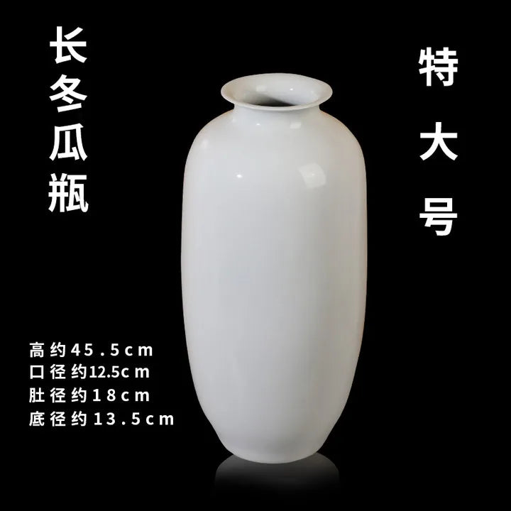 Vase de style oriental, de couleur blanche, avec des dimensions précises indiquées.