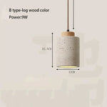 suspension lumineuse moderne pierre naturelle texture marbrée câble suspendu interrupteur bouton éclairage maison décoration