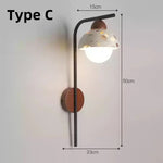 lampe murale moderne ampoule led noir marron beige blanc texture granulaire minimaliste fixée mur
