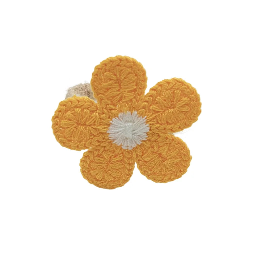 fleurs crochetées main artisanale tringle decoration table mariage pique nique brunch après midi thé