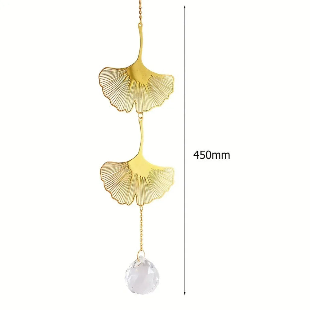 mobile décoratif doré transparent fleurs feuilles cristal chaîne dorée artisanal élégant fenêtre