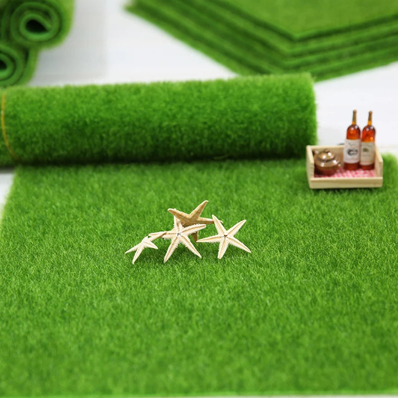 tapis imitation herbe vert texture granuleuse decoratif etoiles mer bouteilles clôture fleurs calla jouets