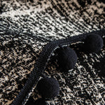 housse canapé moderne blanche taches noires pompons décoratifs protection salon tissu polyester élégant
