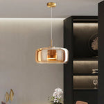 luminaire suspension moderne verre transparent doré câble salon salle manger