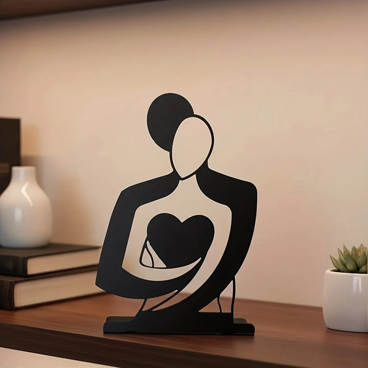 lampe table moderne silhouette cœur noir minimaliste base carrée câble decoration abstraite granulee