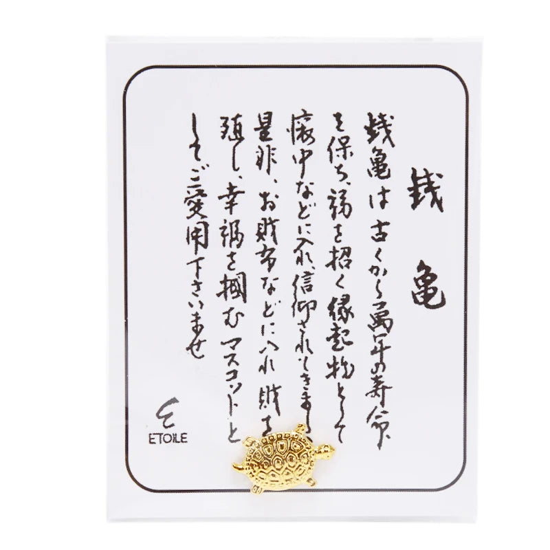 pendentif tortue dorée motif cuir rouge orné feng shui chance richesse décoration intérieure souvenir