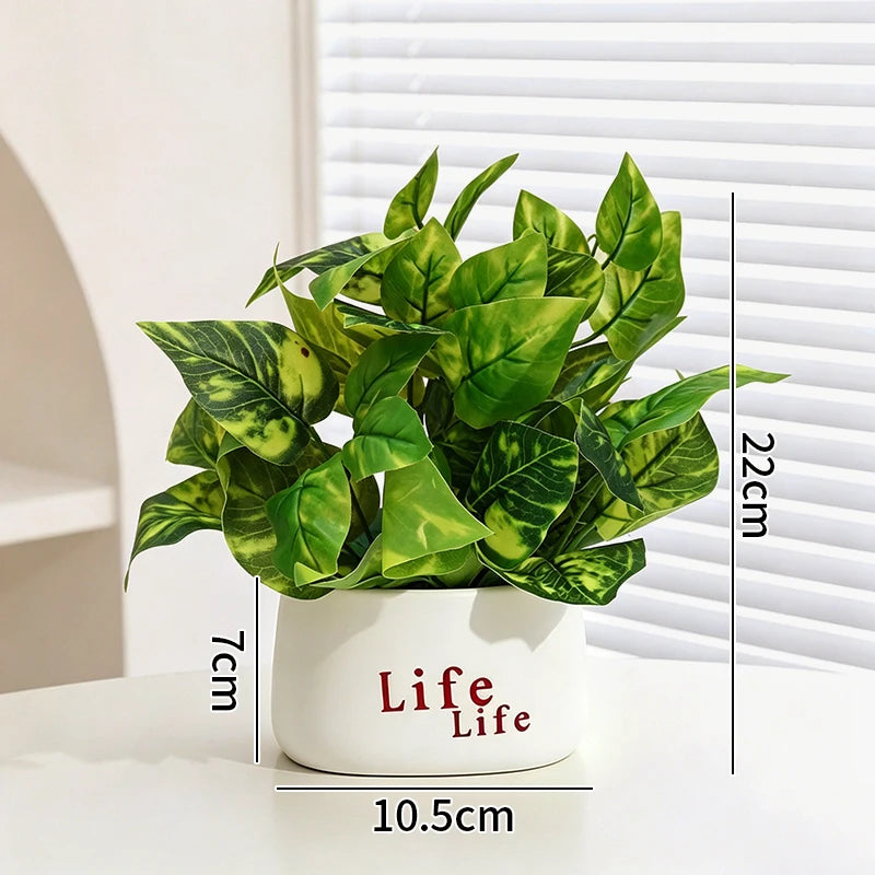 plantes artificielles vertes moderne pots blancs décoration intérieure feuilles variées minimaliste