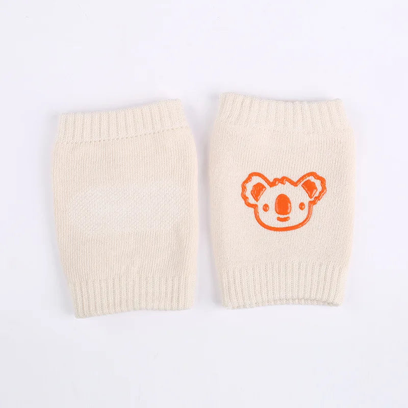 protège genoux bébé coton acrylique unisexe bleu clair jaune rose gris vert smiley brodés