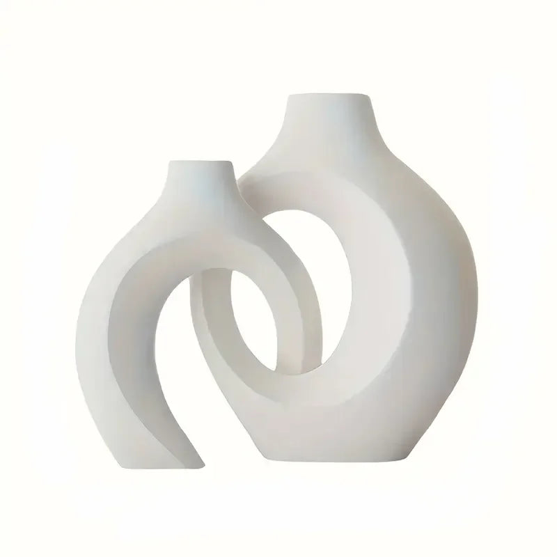 vases decoratifs blancs modernes abstraits incurves fleurs artificielles salon deco minimaliste sculptural