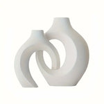 vases decoratifs blancs modernes abstraits incurves fleurs artificielles salon deco minimaliste sculptural