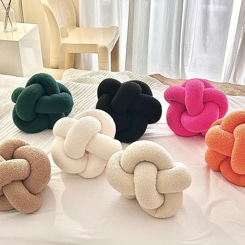 coussin decoratif moderne nœuds complexes couleur vert foncé noir rose beige doux minimaliste salon