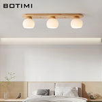 plafonniers modernes trois ampoules led bois naturel lumière blanche minimaliste