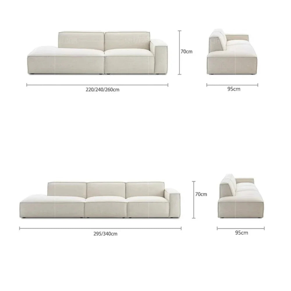 canapé d'angle moderne beige clair uni confortable salon minimaliste inclusion coussins tapis