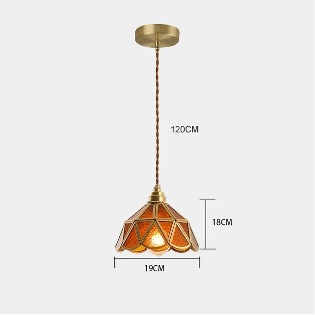 suspension lumineuse verre teinté art deco or marron bleu clair motifs géométriques opacité chaînes