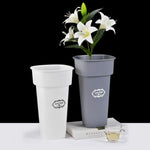 Cache pot moderne blanc noir gris adhésif plante verte décoration jardin urbain rond logo