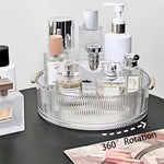 organisateur cosmétiques transparent moderne poignées dorées flacons lotion parfum crème nettoyant sérum baume moussant