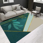 Tapis de sol vert foncé et motifs jaunes géométriques dans un salon moderne avec un canapé gris.