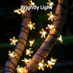guirlande lumineuse solaire fleurs blanc doré 5m 20leds 7m 50leds moderne