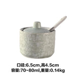 pot condiments porcelaine broyeur épices cuillère fleurs blanches motifs floraux rustique