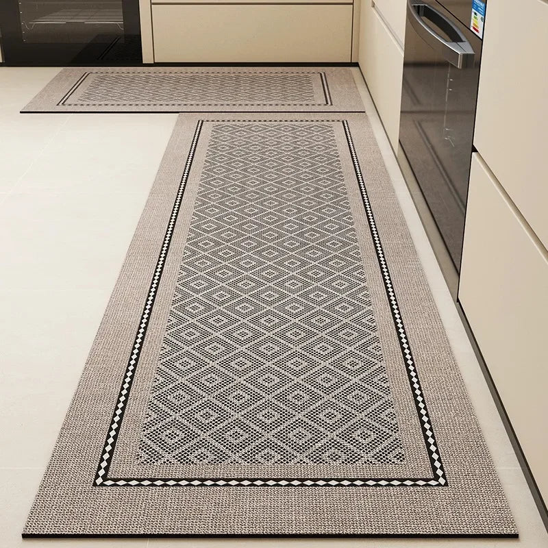 Tapis de cuisine en vinyle à motif graphique géométrique en noir et blanc, offrant une surface antidérapante et durable pour votre cuisine.