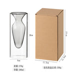 vase transparent goutte forme table arrangement floral rouge jaune vert pâle decoration intérieur