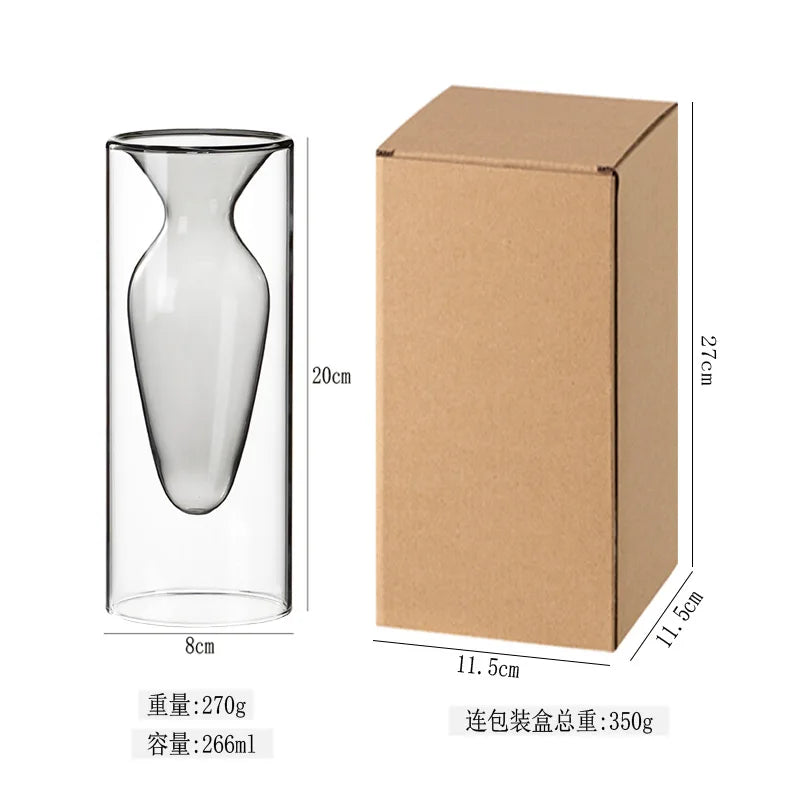 vase transparent goutte forme table arrangement floral rouge jaune vert pâle decoration intérieur