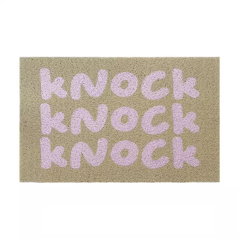 tapis d'entrée moderne lettres knock imprimées beige clair rose pâle antidérapant extérieur porche couloir