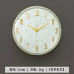 horloge murale moderne nacrée motifs veinés blanc doré irisation verte rose bleue