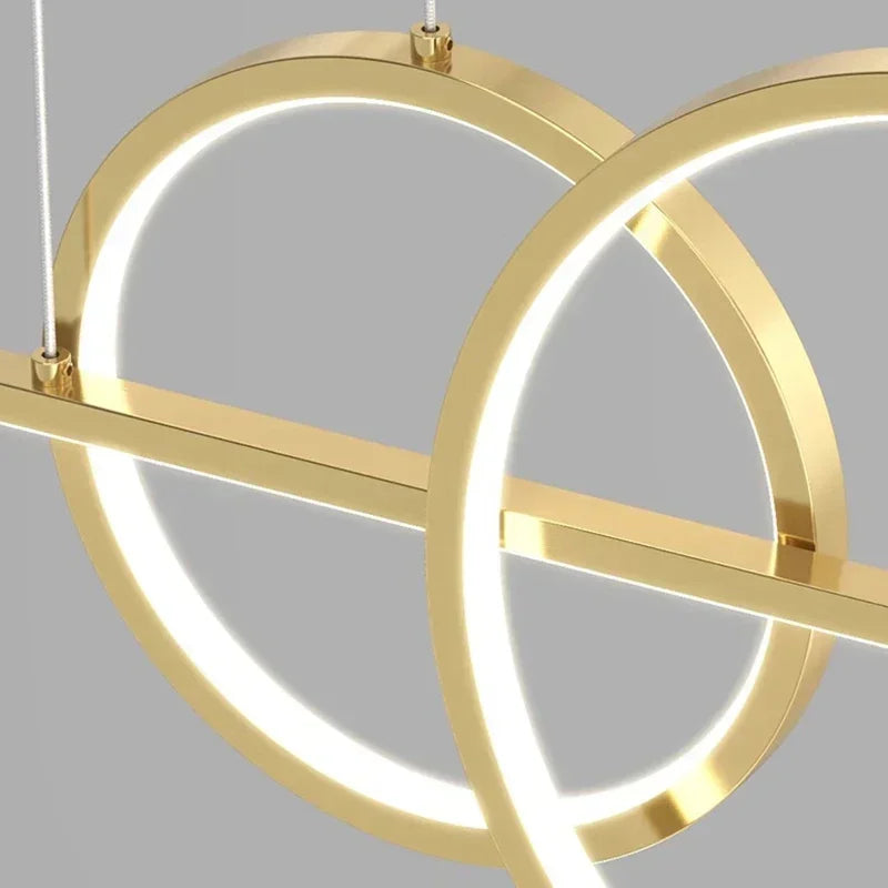 suspension lumineuse moderne or noir minimaliste câbles suspendus panneaux texturés