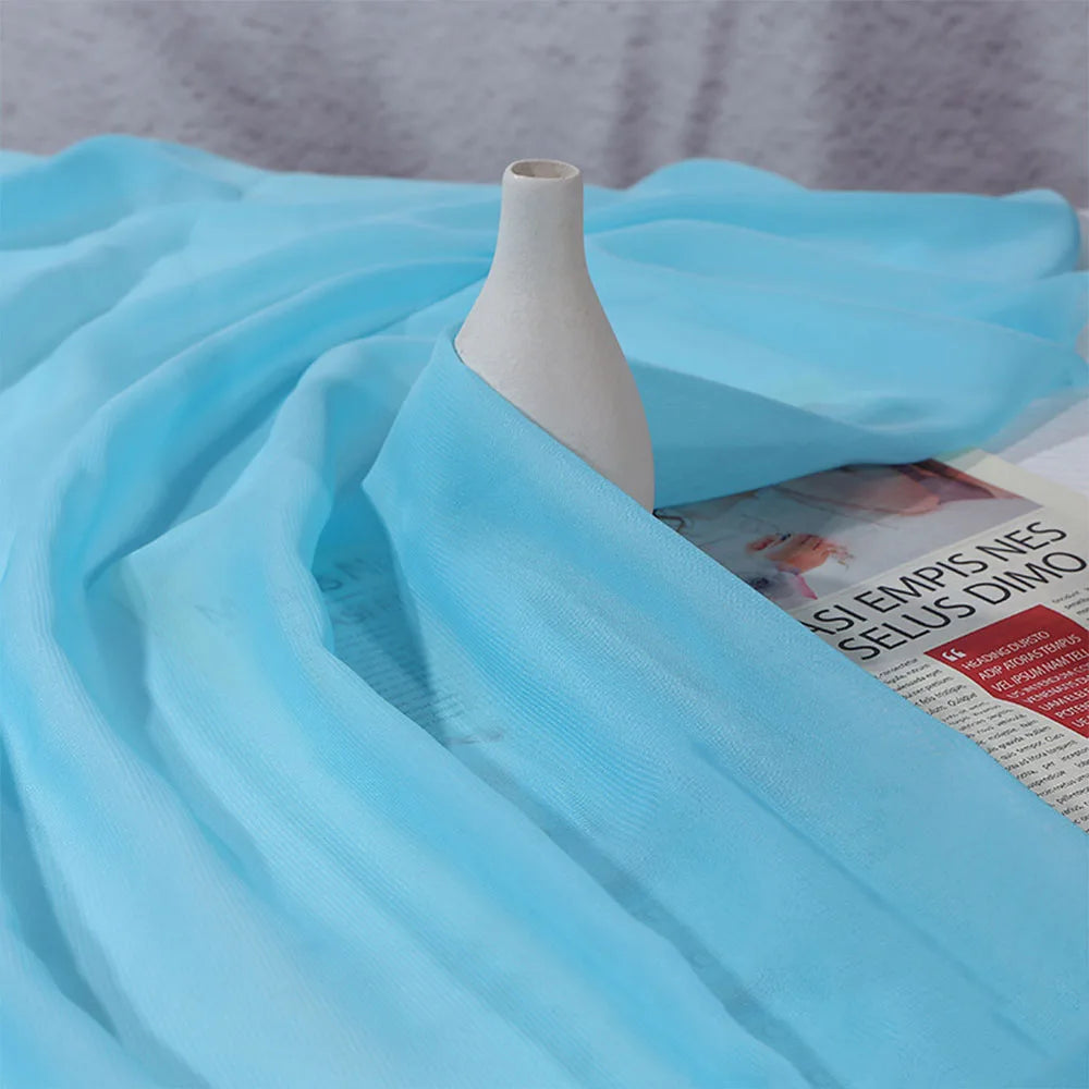 tissu polyester mousseline uni translucide moderne blanc rose bleu violet 150cm cérémonie mariage statuaire