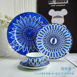 assiettes bleu motif floral tasse blanc classique opacité