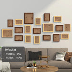 cadres photo bois modernes blancs noirs verre transparent clips inclusion minimaliste mur