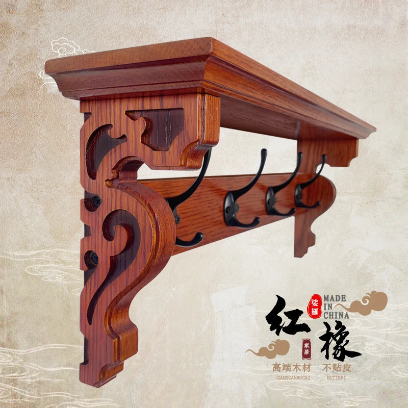 porte manteau étagère murale bois marron foncé crochets décor sculpté motifs floraux classique vis