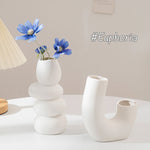 vases blancs modernes céramique rondes lignes horizontales décoration intérieure simple