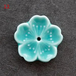 porte bâtonnets encens fleurs stylisées céramique artisanal rose bleu vert blanc jaune pâle marine
