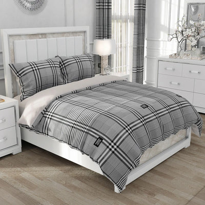 Parure de lit gris à carreaux 240x220 sur un lit queen