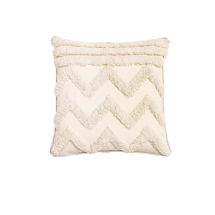 coussin brodé géométrique moderne toile coton couleur beige pompons décoratif