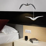 suspension lumineuse moderne oiseau stylisé blanc noir éclairage salon chambre led résine intérieur