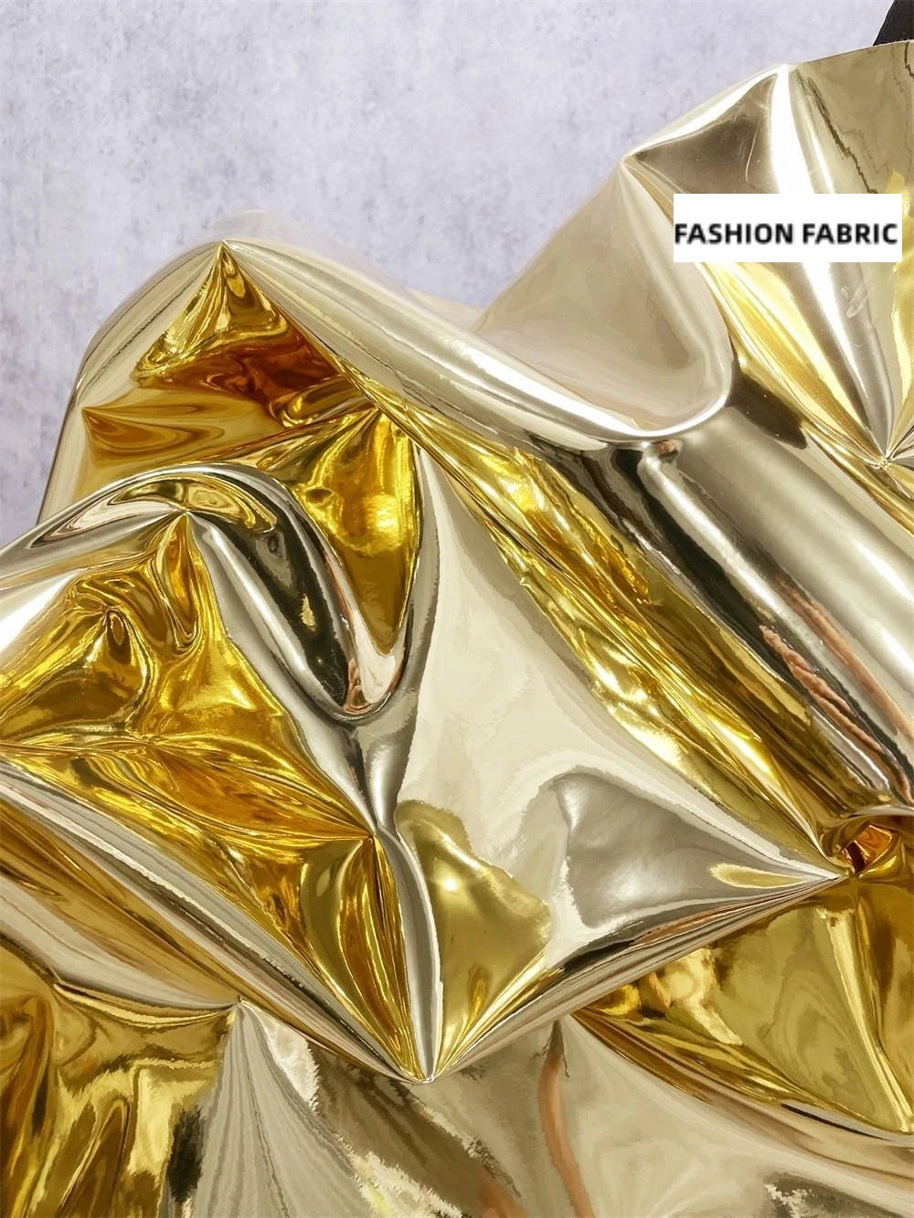 tissu métallique brillant imperméable argent or lisse moderne élégant polyester scenaristique