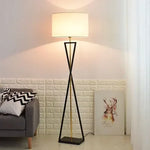 lampe sol moderne abat jour tissé structure géométrique noir doré led minimaliste