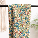 tissu fleuri vintage polyester coton fleurs feuilles chats beiges bleus rouges verts marrons résistance