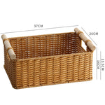 panier tressé naturel poignées bois rangement traditionnel respectueux environnement dimension 37x26cm