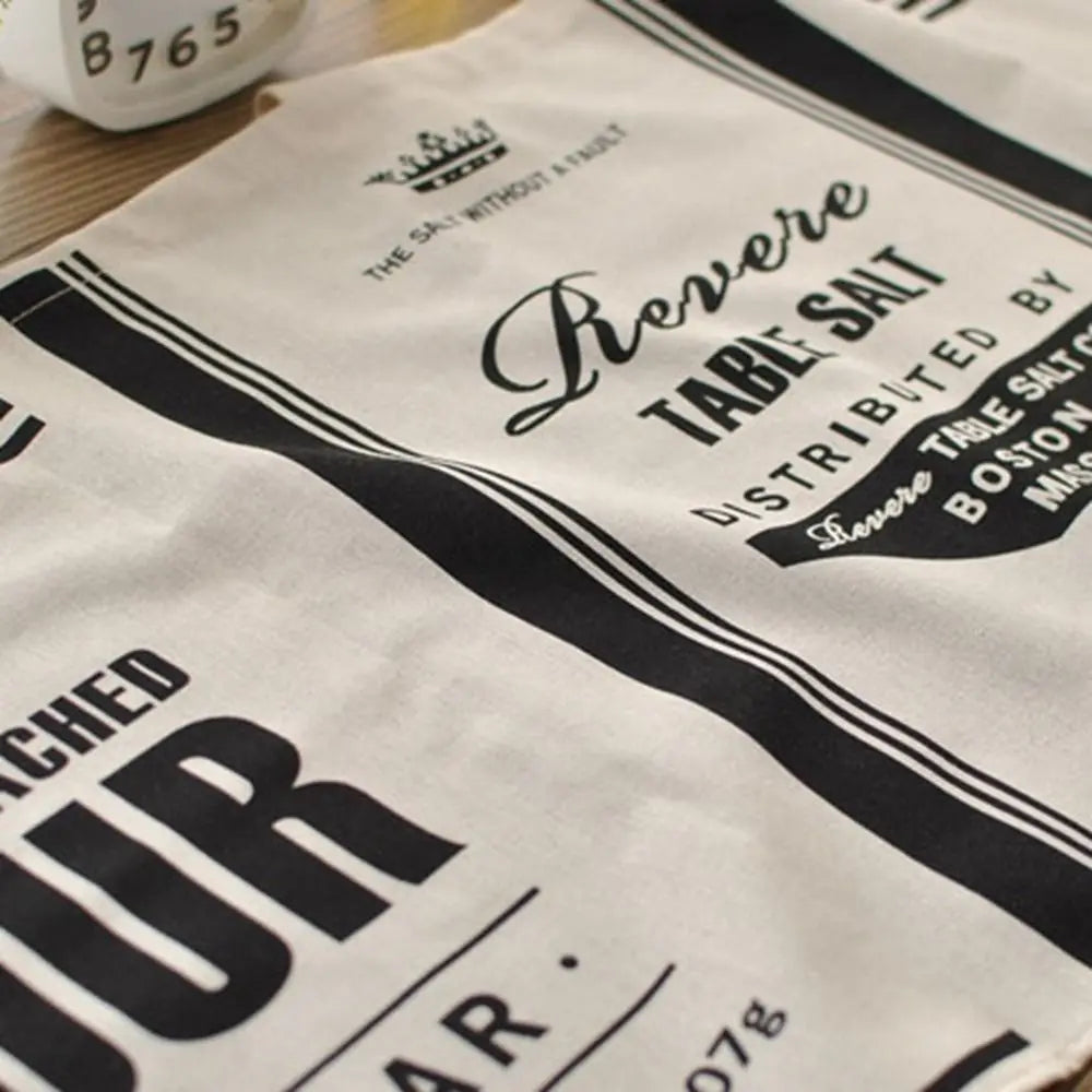 rideau vintage graphique étiquettes anciennes tissu granuleux crème noir suspension tringle métallique