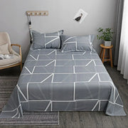 ensemble literie motif géométrique gris jaune moderne minimaliste triangles lignes chambre couple