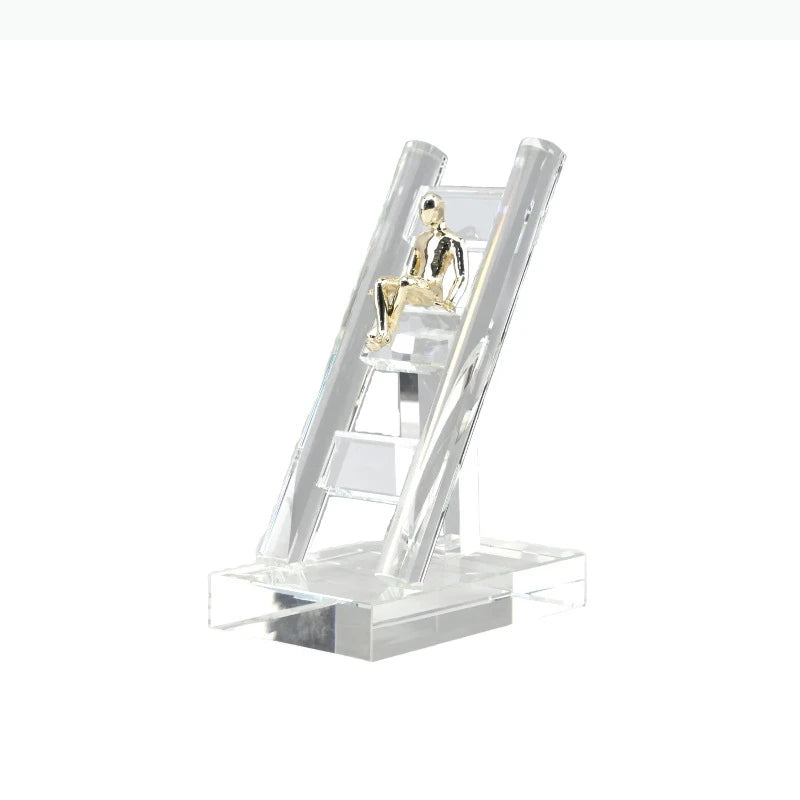 support smartphone transparent moderne figurine dorée minimaliste chambre