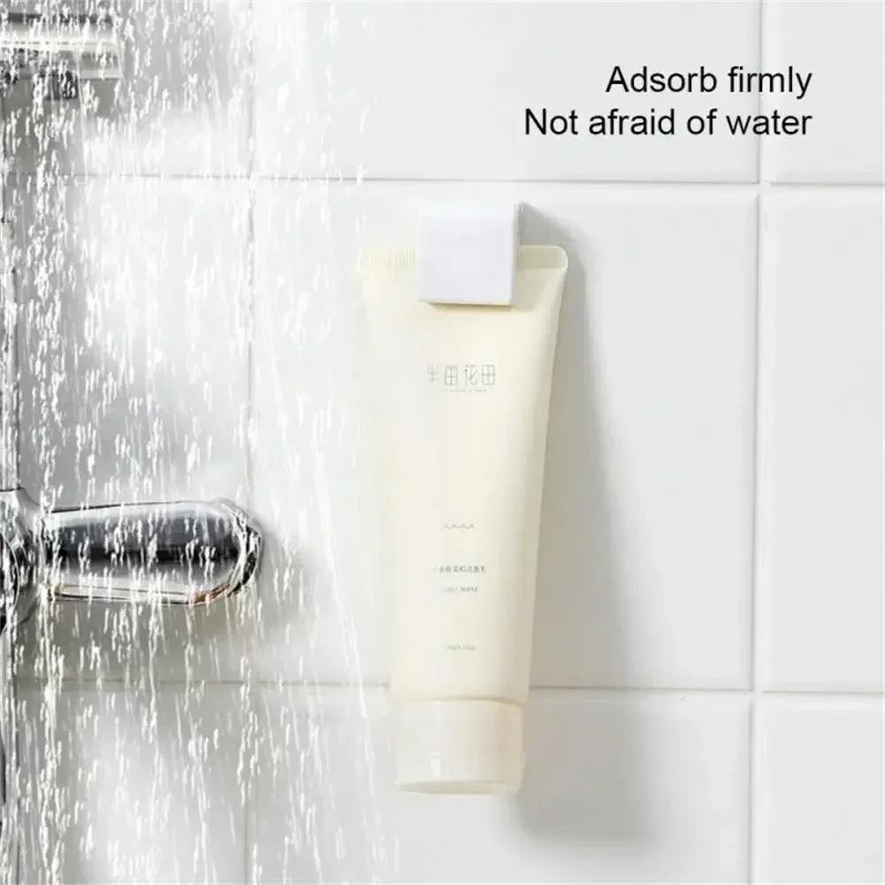 organisateur mural blanc minimaliste tubes crème adhésif logo gouttes d'eau opaque porte dentifrice support