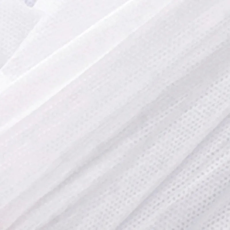 draps housses jetables blancs texture moderne table massage coussin cou