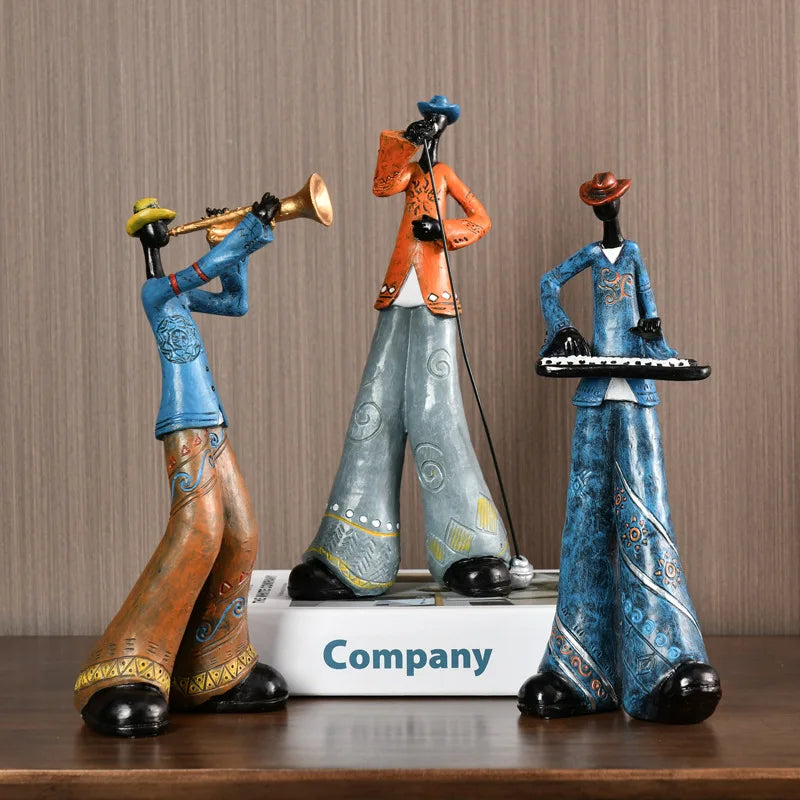 statues musiciens saxophone trompette ethniques motifs floraux bleu marron orange gris